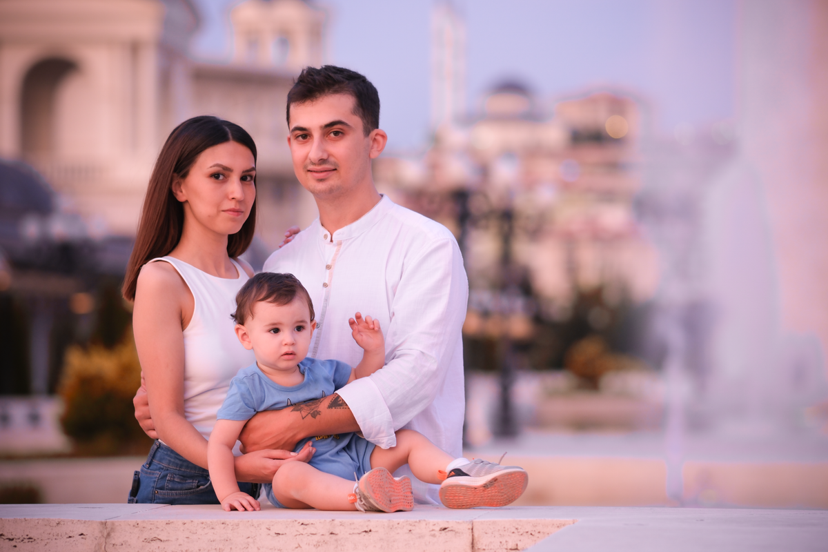 Charming family enjoying a day outdoors in Ankara, capturing delightful emotions.