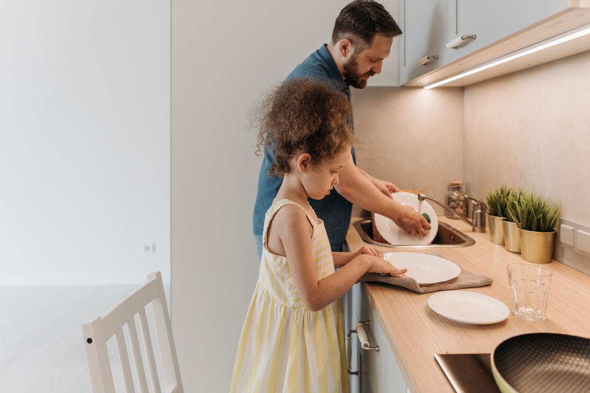 A child helping wash dishes in the kitchen - Photo by Pavel Danilyuk on Pexels